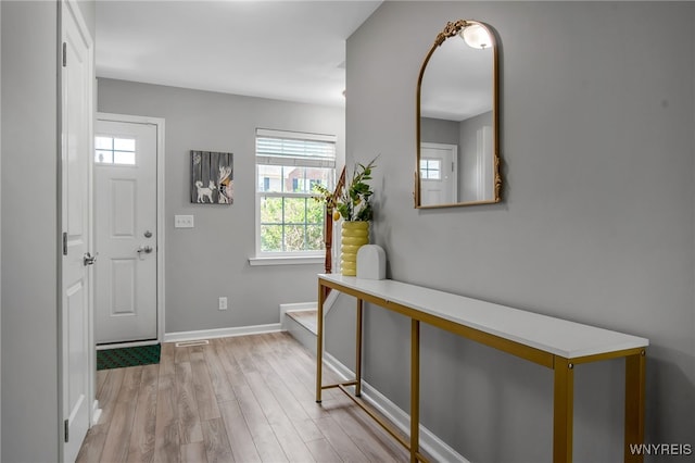 5 Scooter Ln, Hamburg, NY 14075 - foyer entrance featuring light wood finished floors and baseboards