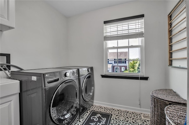 5 Scooter Ln, Hamburg, NY 14075 - laundry room featuring washer and dryer and cabinet space