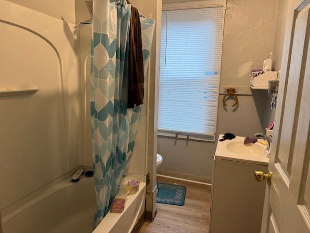 355 Champlain St Unit 353, Rochester, NY 14611 - full bathroom with vanity, shower / bath combo with shower curtain, and wood finished floors