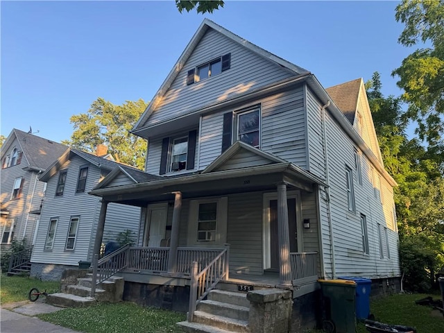 355 Champlain St Unit 353, Rochester, NY 14611 - american foursquare style home featuring a porch