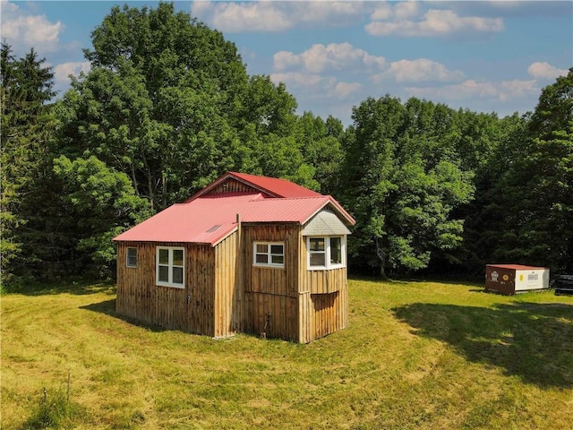 672 Backus Rd, New Lisbon, NY 13415 - view of shed featuring a forest view