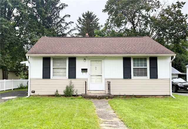 154 Fiscoe Ave, Syracuse, NY 13205 - bungalow-style home with roof with shingles
