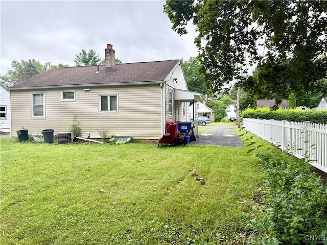 154 Fiscoe Ave, Syracuse, NY 13205 - back of property with a chimney