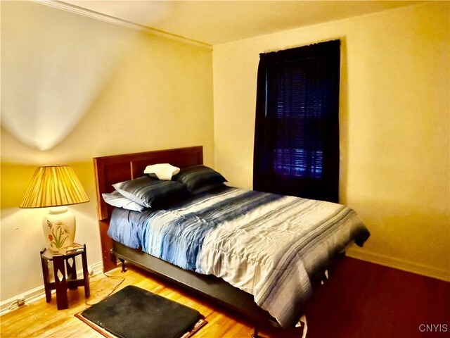 154 Fiscoe Ave, Syracuse, NY 13205 - bedroom featuring wood finished floors and crown molding