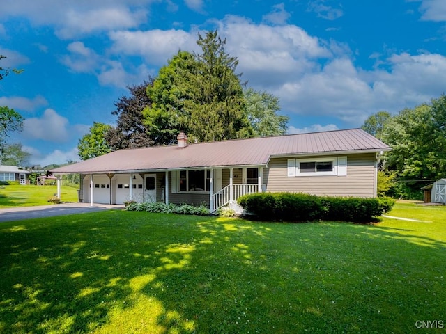 9242 Sixty Rd, Lysander, NY 13135 - ranch-style home featuring a porch, a garage, a front yard, and driveway