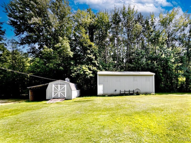 9242 Sixty Rd, Lysander, NY 13135 - view of green lawn featuring an outbuilding and a storage unit