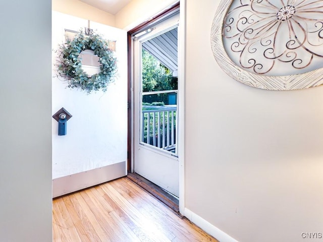 9242 Sixty Rd, Lysander, NY 13135 - doorway to outside featuring light wood-style floors