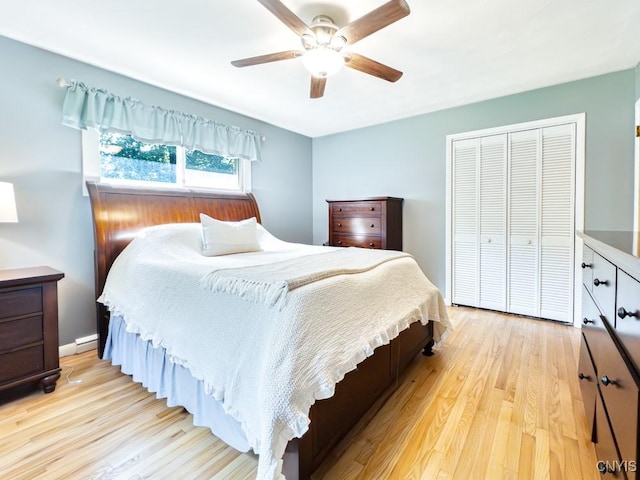 9242 Sixty Rd, Lysander, NY 13135 - bedroom with a closet, light wood-type flooring, and ceiling fan