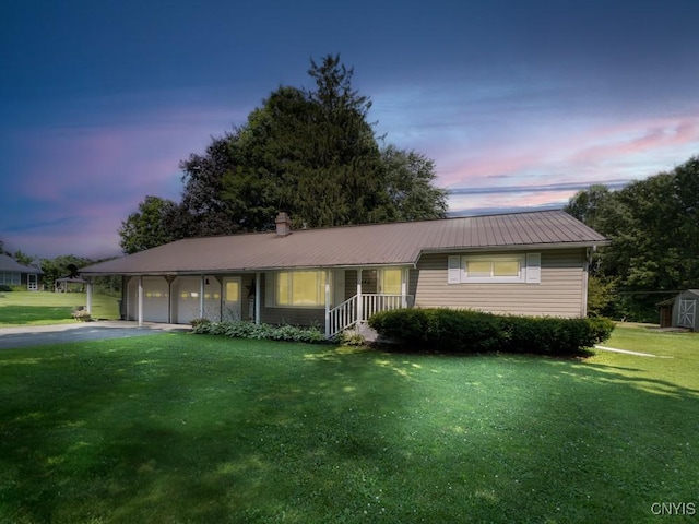 9242 Sixty Rd, Lysander, NY 13135 - single story home with a front lawn, driveway, a garage, a metal roof, and a shed