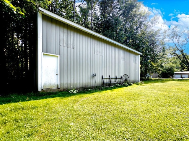 9242 Sixty Rd, Lysander, NY 13135 - view of pole building with a lawn