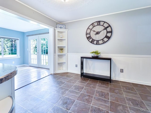 9242 Sixty Rd, Lysander, NY 13135 - doorway with french doors and a wainscoted wall