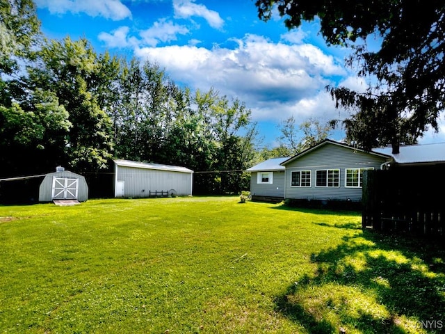9242 Sixty Rd, Lysander, NY 13135 - view of green lawn featuring a storage shed