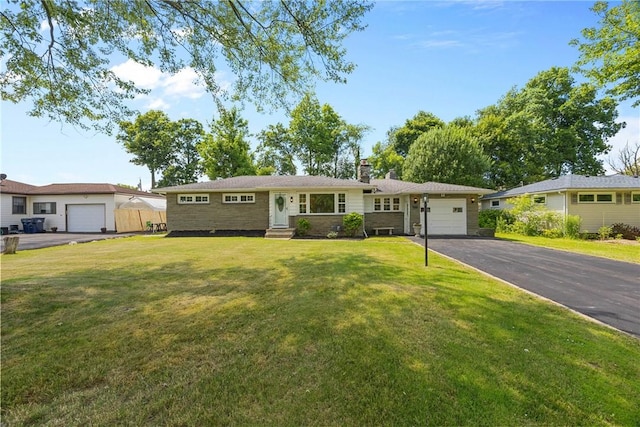 33 W Crest Dr, Gates, NY 14606 - single story home featuring asphalt driveway, an attached garage, a chimney, a front yard, and entry steps
