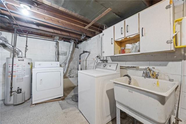 33 W Crest Dr, Gates, NY 14606 - laundry area with gas water heater, cabinet space, and washing machine and dryer