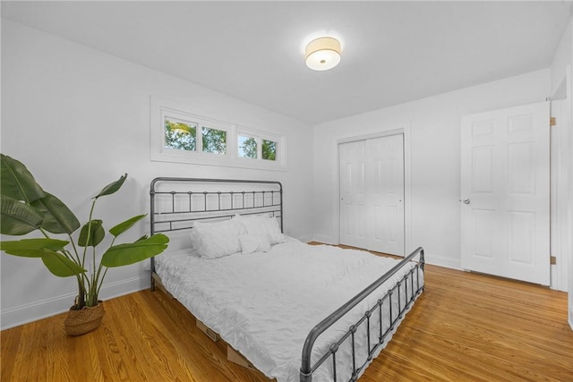 33 W Crest Dr, Gates, NY 14606 - bedroom featuring wood finished floors and a closet