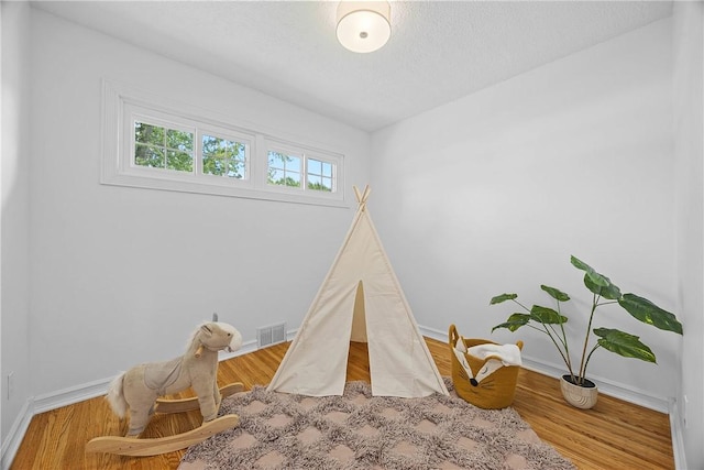 33 W Crest Dr, Gates, NY 14606 - rec room featuring baseboards and wood finished floors