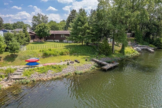 117 Shoreview Dr, Clay, NY 13090 - dock area featuring a water view, view of wooded area, and an outdoor fire pit