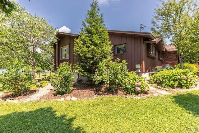 117 Shoreview Dr, Clay, NY 13090 - view of home's exterior with a lawn