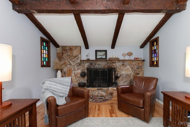 117 Shoreview Dr, Clay, NY 13090 - living room with beamed ceiling, wood finished floors, and a fireplace