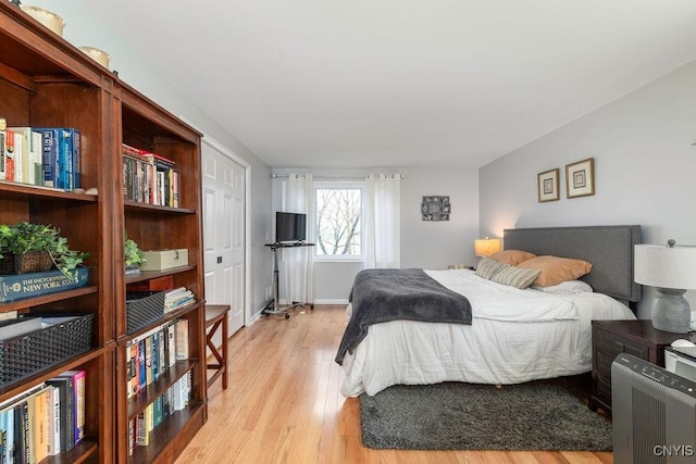 117 Shoreview Dr, Clay, NY 13090 - bedroom with light wood-type flooring and baseboards
