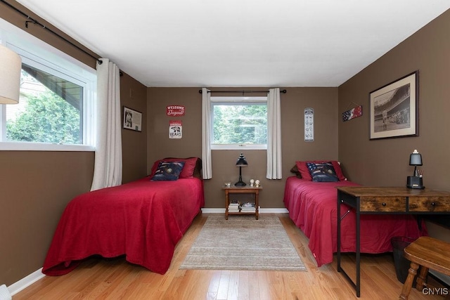 117 Shoreview Dr, Clay, NY 13090 - bedroom featuring light wood-type flooring and baseboards