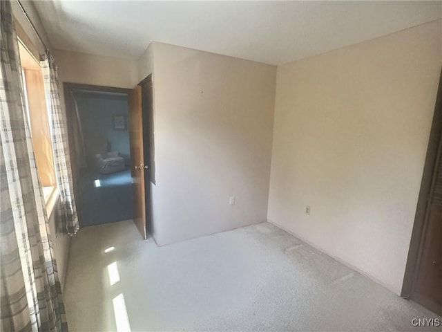 313 Chestnut St, Oswego, NY 13126 - empty room with plenty of natural light