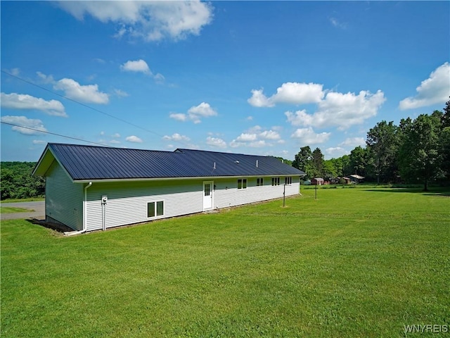 213 Bradshaw Rd, Dryden, NY 13053 - rear view of property featuring a yard and a metal roof