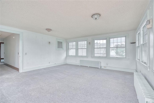 112 Isabelle St, Rochester, NY 14606 - unfurnished sunroom featuring radiator