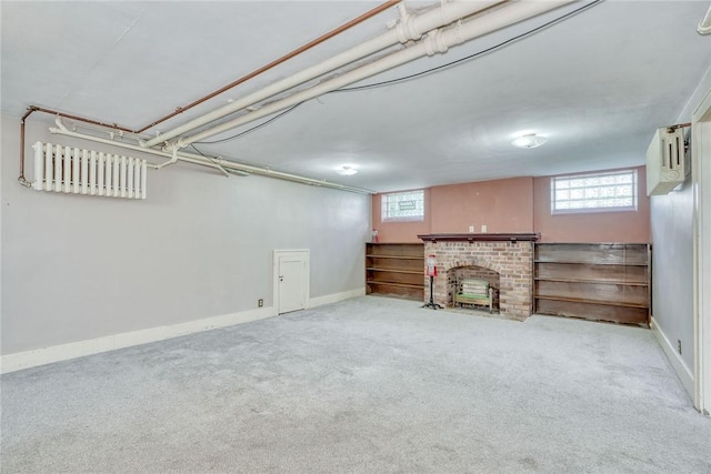 112 Isabelle St, Rochester, NY 14606 - below grade area featuring carpet and a brick fireplace