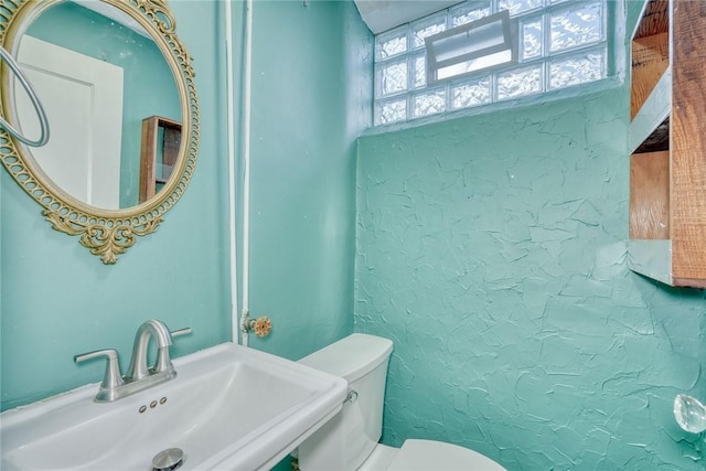 112 Isabelle St, Rochester, NY 14606 - bathroom featuring a sink and a textured wall