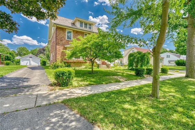 112 Isabelle St, Rochester, NY 14606 - view of front of home with an outbuilding, a garage, brick siding, and a front lawn