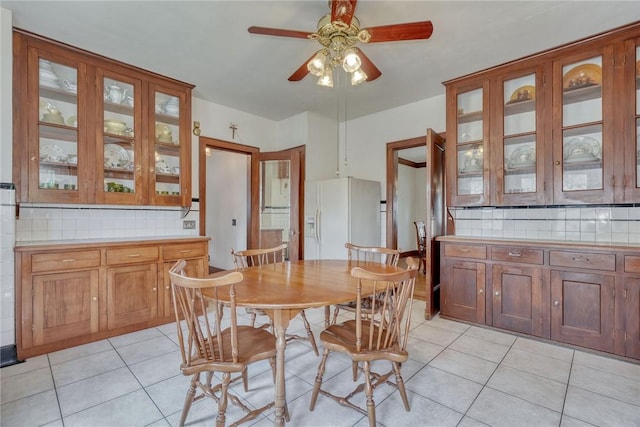 112 Isabelle St, Rochester, NY 14606 - dining area with ceiling fan and light tile patterned floors