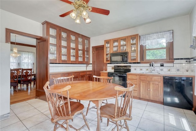 112 Isabelle St, Rochester, NY 14606 - dining area featuring plenty of natural light, ceiling fan, and light tile patterned flooring