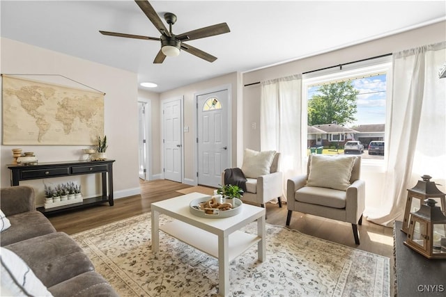 161 Forrest St, Deerfield, NY 13502 - living room with wood finished floors and ceiling fan