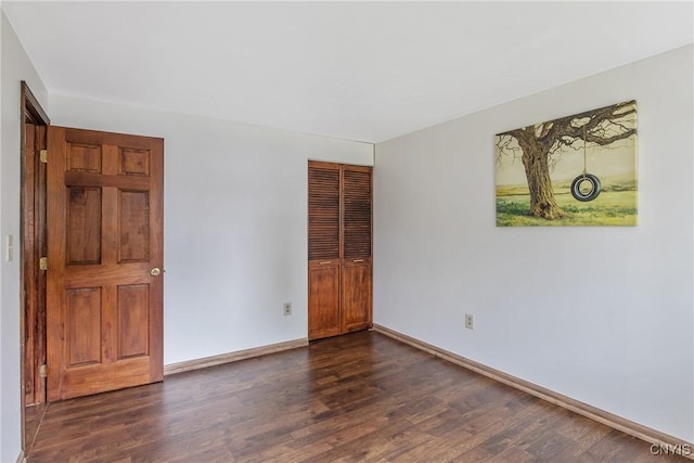 3675 Buttercup Ln, Clay, NY 13027 - unfurnished room featuring dark wood-type flooring and baseboards