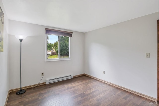 3675 Buttercup Ln, Clay, NY 13027 - spare room with a baseboard radiator and wood finished floors