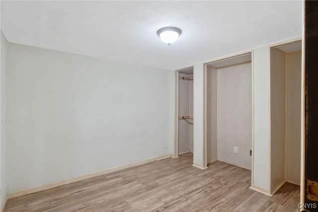 3675 Buttercup Ln, Clay, NY 13027 - unfurnished bedroom with light wood finished floors and baseboards