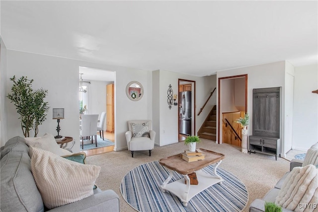 3675 Buttercup Ln, Clay, NY 13027 - carpeted living room featuring stairs and a chandelier
