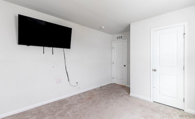 52 Winterbrook Dr, Amherst, NY 14228 - unfurnished bedroom with light colored carpet and baseboards