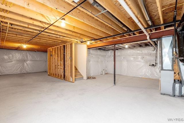 52 Winterbrook Dr, Amherst, NY 14228 - unfinished below grade area featuring stairway and heating unit