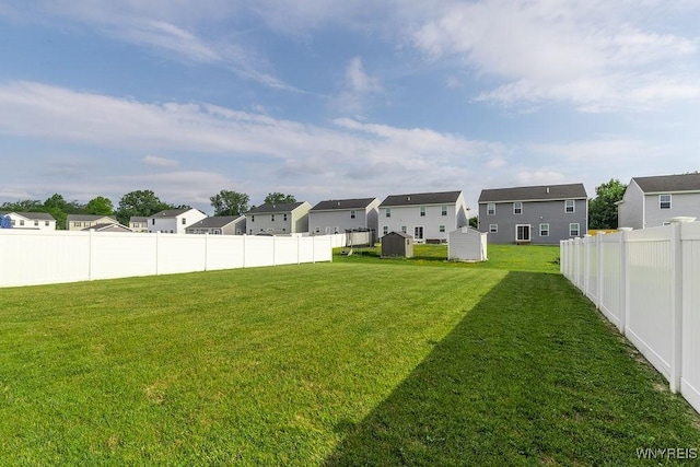 52 Winterbrook Dr, Amherst, NY 14228 - fenced backyard featuring a storage shed and a residential view