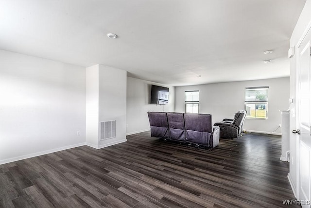 52 Winterbrook Dr, Amherst, NY 14228 - living area featuring dark wood-style flooring and baseboards