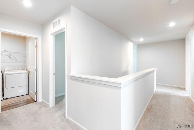 52 Winterbrook Dr, Amherst, NY 14228 - corridor with washer / dryer, light carpet, recessed lighting, and an upstairs landing