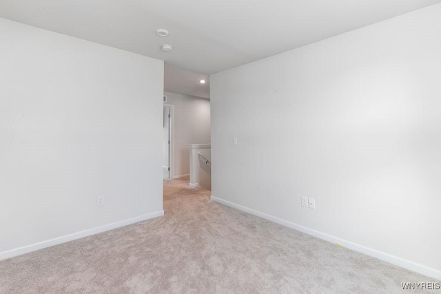 52 Winterbrook Dr, Amherst, NY 14228 - empty room with light colored carpet, a smoke detector, and recessed lighting