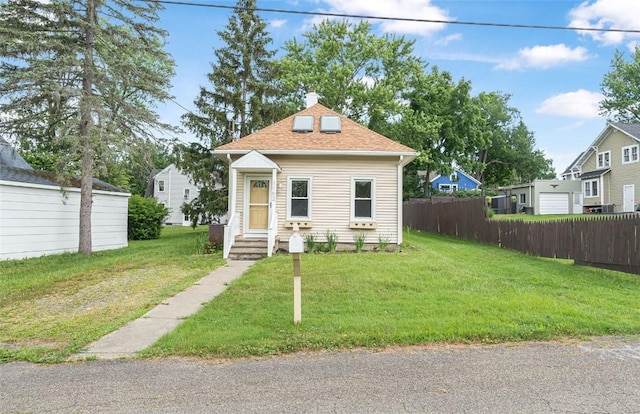 1162 Draper Ave, Elmira, NY 14905 - view of front of house with a chimney and a shingled roof