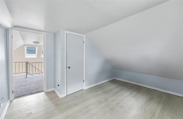 1162 Draper Ave, Elmira, NY 14905 - additional living space with light wood-style flooring and lofted ceiling