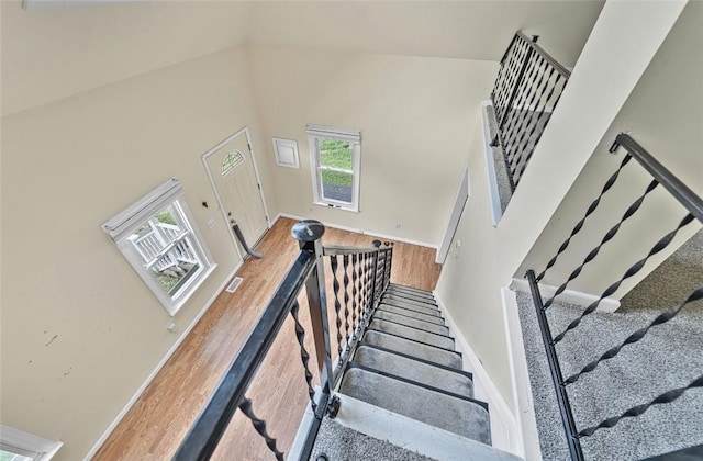 1162 Draper Ave, Elmira, NY 14905 - stairway featuring wood finished floors and a towering ceiling