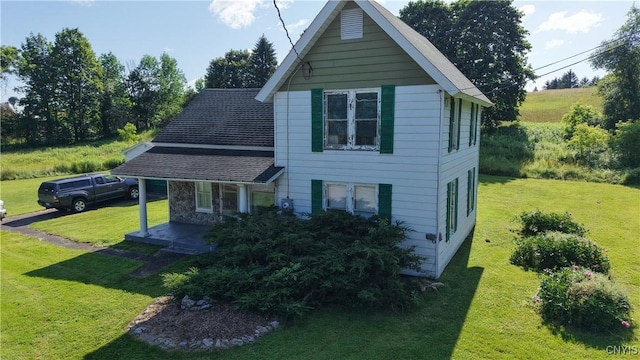 202 County Highway 25a, Richfield, NY 13439 - view of front facade featuring a front yard