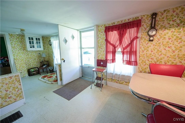 202 County Highway 25a, Richfield, NY 13439 - dining room featuring wallpapered walls and tile patterned floors