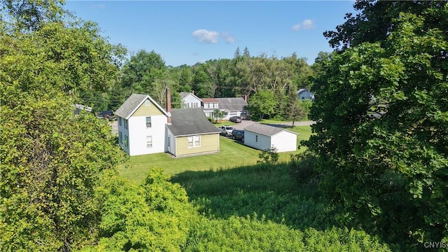 202 County Highway 25a, Richfield, NY 13439 - aerial view of property and surrounding area with a forest